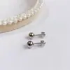 Aretes de Tuerca Geométricos de Estrella de Acero Titanio con Bolas de Acero Grandes y Pequeñas de Moda Simple al por Mayor de Fábrica de Venta Caliente Aretes Perforados Mujeres