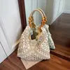 Bolso de Paja Calado Transfronterizo para Mujer Nuevo Verano 2025 Bolso de Hombro Tote Bolso Tejido de Playa Vacaciones en la Costa