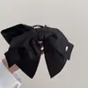 Pinza para Cola de Caballo con Lazo Negro Simple Estilo Coreano Pinza para el Cabello con Etiqueta Dorada de Moda Accesorios para el Cabello de Alta Gama Estilo Occidental para Mujeres