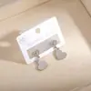 Pendientes de Aro Creativos Huecos de Amor Nuevos Más Vendidos Transfronterizos Europeos y Americanos para Mujer, Joyería de Oreja Personalizada Exquisita y de Moda al por Mayor