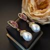 Elegantes pendientes de alta gama con forma de gota de agua blanca y plumas de diamantes de imitación rosas retro para mujer, otoño e invierno 2024, venta al por mayor