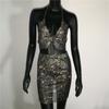 Traje nuevo transfronterizo europeo y americano, traje de cuerpo entero con tiras halter, falda de cuerpo entero, mini falda sexy ajustada de red de pesca con pedrería para mujer