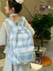 Nova Mochila Xadrez Versátil da Moda Ultraleve Casual para Estudantes do Ensino Fundamental e Médio Mochila de Grande Capacidade Atacado