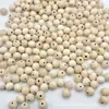 Venta al por mayor del fabricante 12mm Cuentas de Madera, Cuentas de Madera de Loto con Agujero Medio, Cuentas de Madera Sueltas, Accesorios, Ganchos para Ropa y Sombreros, Bolas Redondas de Madera de Loto