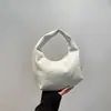 Bolsa de Tecido de Alta Qualidade Estilo Francês para Mulheres, Nova Tendência 2026 Bolsa Dumpling, Bolsa de Textura Exclusiva para o Dia a Dia, Bolsa de Mão Versátil