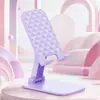 Soporte de Escritorio para Teléfono Ajustable Elevable Creativo Lindo Soporte de Teléfono para Transmisión en Vivo Grabación Persona Perezosa Multifuncional Nuevo Modelo 2026