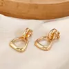 Nuevos pendientes geométricos de metal lisos simples combinables sin agujero en la oreja clip para oreja estilo frío europeo y americano venta caliente transfronteriza