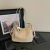 Bolsa de ombro minimalista cor sólida estilo coreano, modelo novo outono 2026, mochila para trabalho e deslocamento, bolsa de ombro