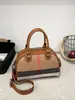 Bolso con Estampado de Rayas para Mujer 2026 Nuevo Estilo de Lujo Ligero Versátil para Viajar al Trabajo Bolso de Hombro Cruzado Transfronterizo