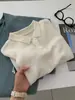 Exquisita Camiseta Polo Manga Curta Jacquard Vazado Retrô Tricotada Feminina Estilo Francês Branco Gelo Seda de Gelo Verão 2026