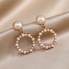 Fábrica directa de origen Pendientes de aro de perlas simples coreanos moda huecos geométricos elegantes pendientes dulces para niña
