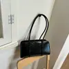 Bolsa de Axila Casual Nicho Retrô Feminina Verão 2026 Novo Estilo Coreano Moda Cor Sólida Portátil de Ombro Único Bolsa Tote