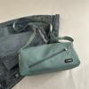 Bolsa Grande Capacidade Feminina 2024 Nova Moda Casual Versátil Tecido Explosivo Bolsa de Ombro Viagem de Curta Distância Bolsa Transversal