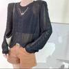 Suéter de manga larga irregular con cuello redondo y cadena hueca de estilo relajado de Dongdaemun, primavera y otoño de 2023