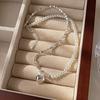 Collar de perlas con colgante de corazón de plata, collar de nicho de lujo ligero, diseño de alta gama, sentido en línea, temperamento de celebridad, cadena de clavícula femenina