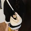 Bolsa de Dumpling Popular de Verano para Mujer 2025 Nueva Versátil Casual Bolso de Hombro Simple Color Puro Bolso Cruzado de Alta Gama