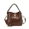 Exquisito y moderno bolso de mano tipo cubo 2026 nueva moda bolso cruzado versátil para mujer, bolso tote pequeño para salir