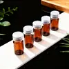Botella de aceite de té multiusos de vidrio suministro 1ml 5ml botella de aceite esencial de vidrio marrón suministro de fábrica