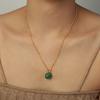 Europa y Estados Unidos nuevo estilo palacio retro personalidad titanio acero chapado en oro esmalte concha blanca malaquita collar colgante joyería mujeres