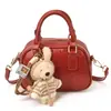 Bolsa de Mão Fashion Bag Bowling Bag para Mulheres 2026 Início da Primavera Nova Estilo Coreano Bolsa de Ombro Simples Design de Nicho Bolsa Transversal para Mulheres
