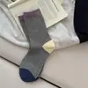 Calcetines para Niños 2026 Otoño/Invierno Nuevos Calcetines de Algodón Transpirables a Rayas y Bloques de Color de Media Pantorrilla Caídos para Niñas