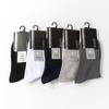 Calcetines para hombre casual de negocios calcetines de tubo transpirables absorbentes de sudor calcetines de hombre fabricantes fuente mayoreo otoño e invierno calcetines de tubo para hombre negros