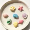 Mini Serie Océano Conchas Pequeñas de Colores, Caracolas, Estrellas de Mar, Accesorios de Resina de Pegamento Cremoso DIY Venta al por Mayor Transfronteriza