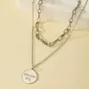 Europa y Estados Unidos diseño de moda transfronterizo sentido redondo colgante de marca collar personalidad femenina hip hop estilo punk cadena de clavícula para hombre venta al por mayor