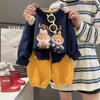 Conjunto de Moletom e Calça de Moletom Infantil Duas Peças Novo Primavera/Outono 2026 Menina Bebê Fofo Conjunto Top e Calça Labubu