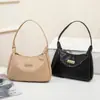 Tendencia Transfronteriza Primavera 2026 Bolso de Hombro Cruzado con Forma de Empanadilla Tejido de PU con Cremallera Bolso Suave Tamaño Mediano para Uso Diario