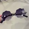 Nuevas gafas de sol infantiles sin montura de cabeza de zorro transfronterizas, moda, personalidad, Europa y Estados Unidos, participan en nubes infinitas, patilla de espejo metálico, tinta
