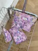 Nueva Bolsa de Cosméticos Morada con Relieve de Flores de Gran Capacidad Transfronteriza Bolsa de Almacenamiento Portátil para Salir Bolso de Mano para Niña