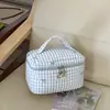 Bolsa de maquiagem modelo novo 2026 transfronteiriça, bolsa de mão, moderna e versátil, alto valor estético, necessaire de grande capacidade, bolsa de viagem listrada