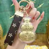 Bendición del Oficial Celestial Oro Puro 999 Llavero Calabaza para Teléfono Móvil Concha de Agua Mismo Estilo Adornos Dorados Pequeños Regalos Fabricante Venta al por Mayor