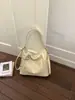 Nueva bolsa de estudiante de gran capacidad para mujer, versátil y texturizada, bolso de un solo hombro bajo el brazo, bolso de mano de cuero suave de moda