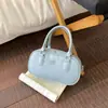 Bolsa de ombro casual e simples estilo coreano para o dia a dia de mulheres, novo modelo de verão 2026, bolsa de ombro estilosa de alta moda