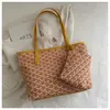 2026 Design de Estampa de Nicho Bolsa de Ombro Grande Capacidade Bolsa Tote Bolsa de Compras Versátil Estilosa Bolsa de Mão para Mulheres