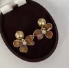 2025 Explosões Moda Ins Coreana Design Brincos Alto Senso Brincos Delicados Pino de Prata Brincos Pétala Maillard