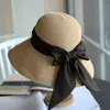 Chapéu de Palha de Aba Larga com Fita de Laço para Férias na Praia Chapéu de Sol Elegante Dobrável com Proteção Facial Chapéu de Pescador para Mulheres Verão