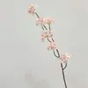 Ornatos decorativos de flor de pessegueiro artificial de alta qualidade em estilo chinês para salas de estar de inspiração Zen, showrooms e arranjos de flores para homestays e adereços de fotografia