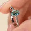 Anillo retorcido ovalado de cuatro garras Shein transfronterizo, personalidad simple, nicho, anillo de lujo ligero, elegante, venta al por mayor