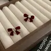 Pendientes de lazo de flocking dulce francés con circonita, elegantes, de lujo ligero, de alta gama, de moda, combinan con todo, tachuelas para orejas de dama