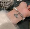 Pulsera de Perlas Planeta Saturno para Mujer Lujo Ligero Nicho Alta Gama Diamante Completo Zircón Pulsera Exquisita Moda Accesorios de Mano