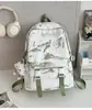 Nova Mochila Tie-Dye Estilo Chinês de Aparência Sofisticada com Cenário Pequeno e Fresco para Alunos do Ensino Fundamental Mochila Leve de Grande Capacidade