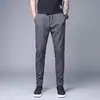 Pantalones casuales de verano de talla grande, finos, de seda de hielo, transpirables, rectos, holgados, modernos, versátiles, de comercio exterior para hombre