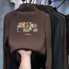 Nueva camiseta versátil de manga larga estilo coreano para otoño e invierno para niños, con cuello alto cálido y hecha de un tejido suave y cómodo