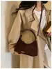 Bolso Pequeño Retro de Gama Alta para Mujer 2026 Nuevo Estilo Bolso de Mano para el Trabajo y el Viaje Bolso Dumpling Moda Otoñal Bolso Cruzado