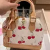 Comercio Exterior 2025 Nuevo Bolso de Mano para Mujer con Concha de Cereza Tricolor Blanco Gran Capacidad Bolso de Hombro Estilo de Moda Tendencia