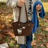 Bolsa Grande Estampa Leopardo para Mulheres 2025 Nova Casual Temporada Comutador Retrô Bolsa de Ombro Estudante Universitário Bolsa Tote para Aula