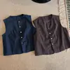 Chaleco cárdigan de punto liso retro japonés para mujer, otoño 2026, cuello redondo, botones a presión, con sentido del diseño y cordón para usar en capas en otoño